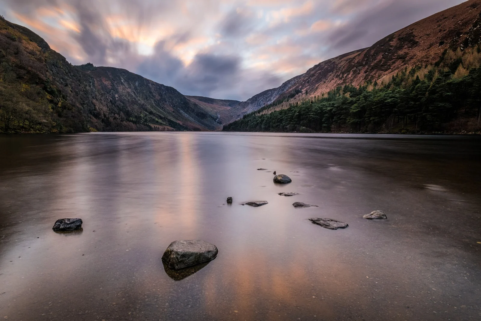 Still water and surrounding hills at Glendalough